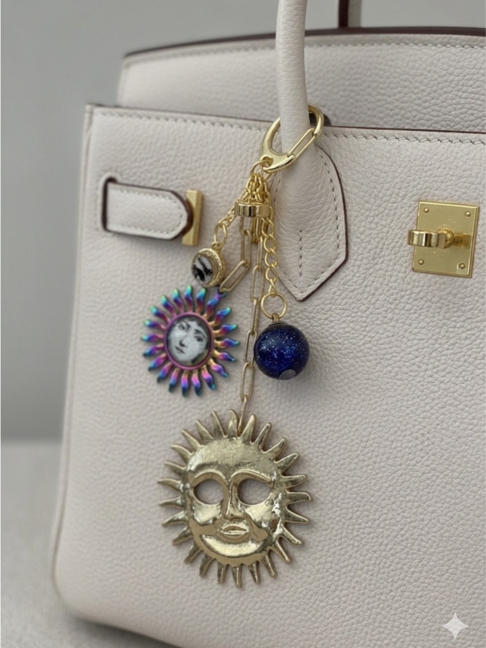 BAG CHARM FORNASETTI Sun Face Charm Keychain - Gold & Iridescent PURPLE